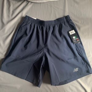 New balance short 7" never used!